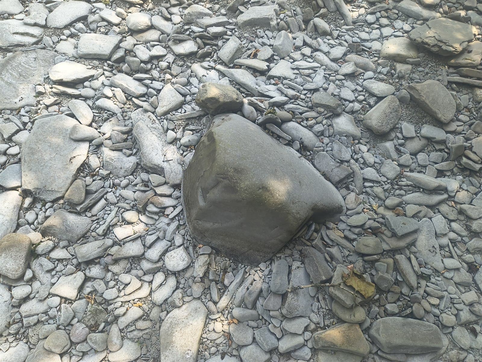 Dark gray natural creek stone close-up
